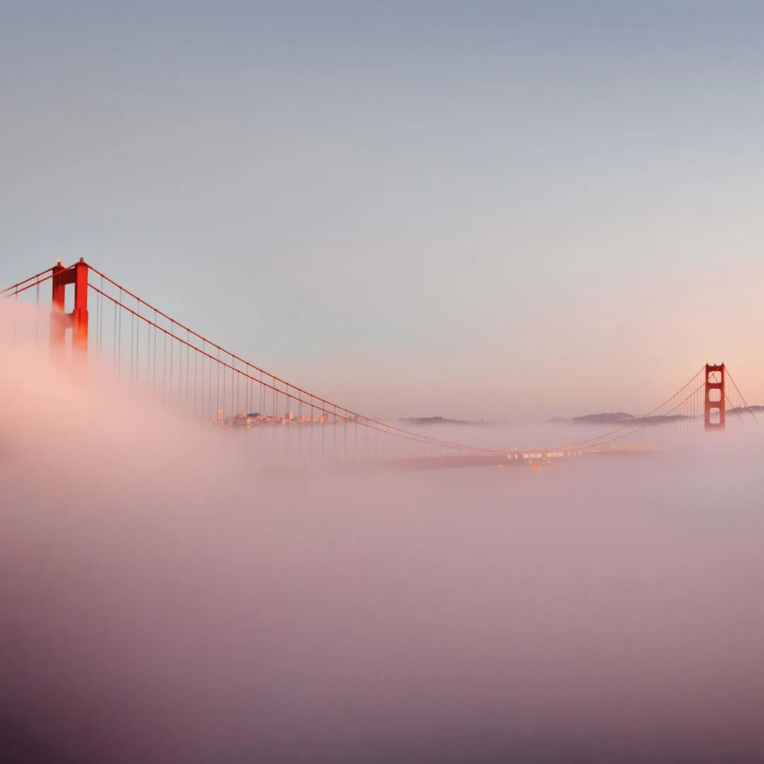 The Golden Gate Bridge emerging from San Francisco fog