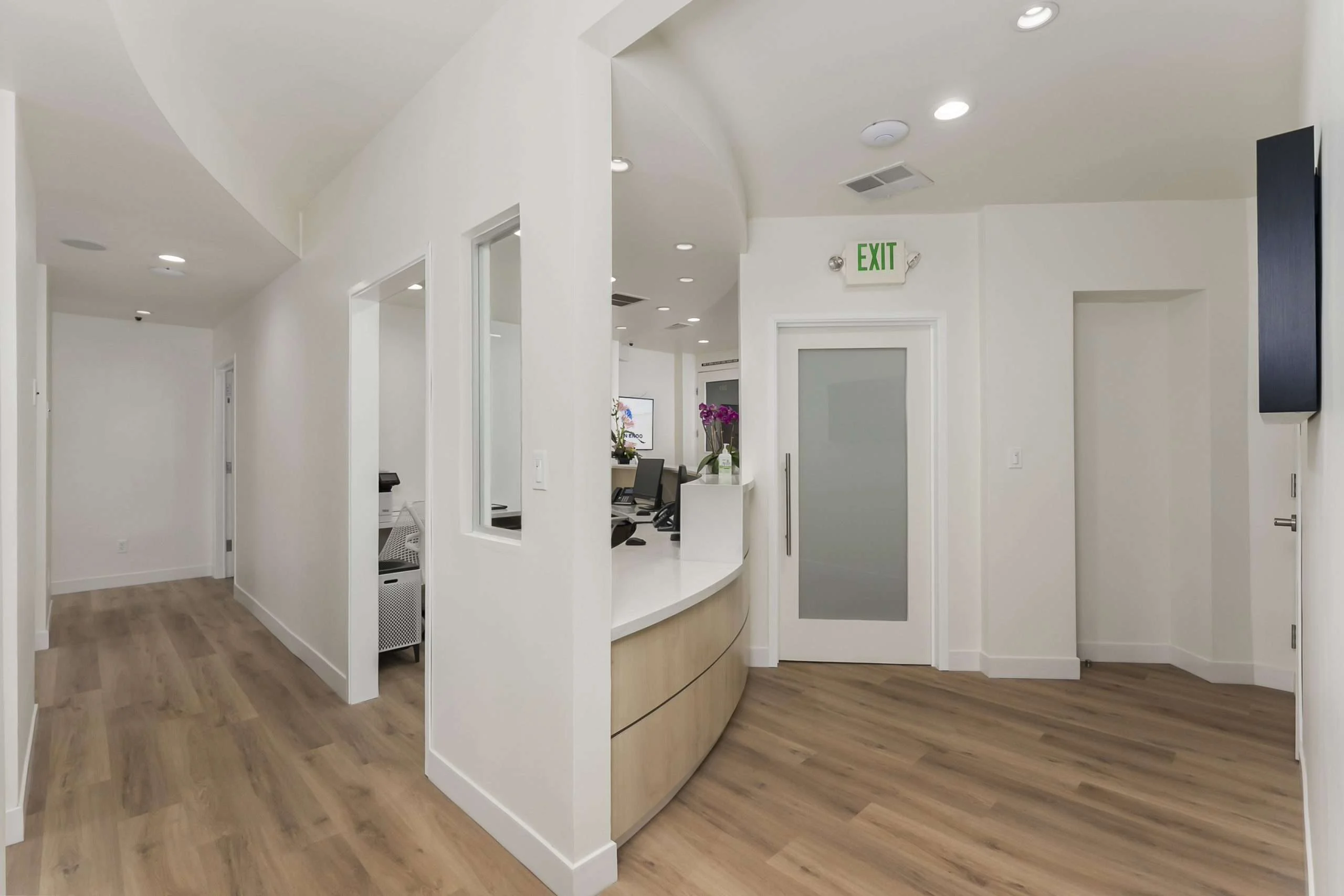 A bright, calm treatment room with large windows at Ocean Endodontics